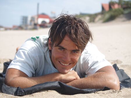 Smiling boy on the beachの写真素材