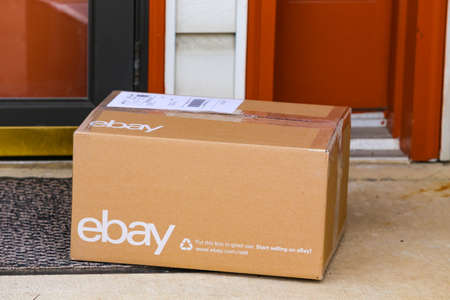 Lancaster, PA, USA - December 4, 2017: An ebay package delivered at a front residential door.のeditorial素材