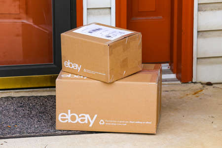Lancaster, PA, USA - December 4, 2017: Multiple ebay packages delivered to a residential front door.のeditorial素材