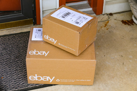 Lancaster, PA, USA - December 4, 2017: Multiple ebay packages delivered to a residential front door.