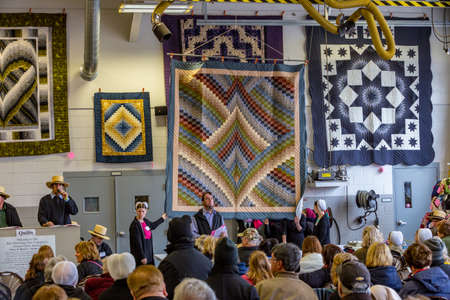 Bart, PA, USA - March 3, 2018: Quilts are just one the many items being sold at the annual Mud Sale at the Bart Fire Company.のeditorial素材