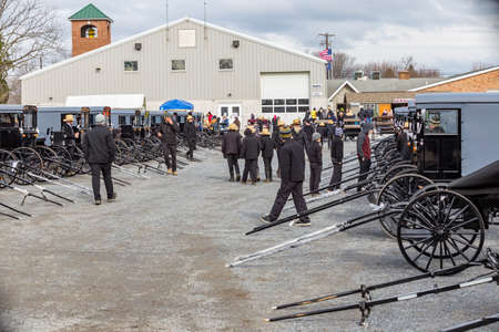 Bart, PA, USA - March 3, 2018: The annual Mud Sale at the Bart Fire Company includes Amish buggies sold at auction.のeditorial素材
