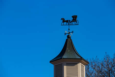 An unusual weather vane features an Amish Buggy.の写真素材