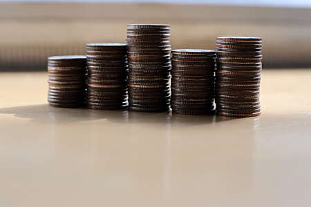 Thai bath coin money put together near the window, natural lighting.の写真素材