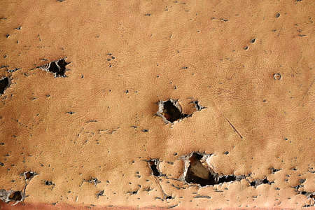 Old grunge texture with hole surfaceの写真素材