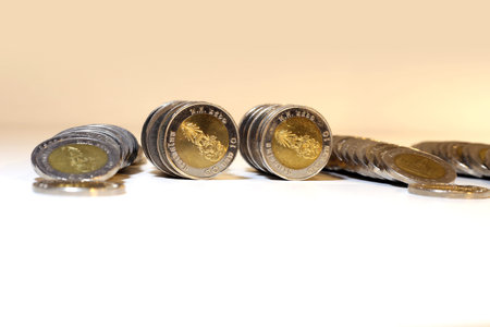 money stack is put together on white background