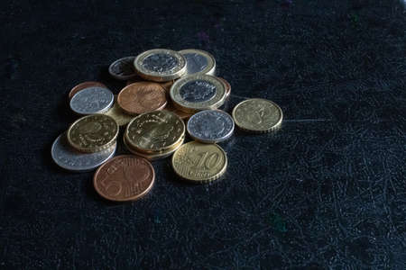 Coins on a black table. Money concept.の写真素材