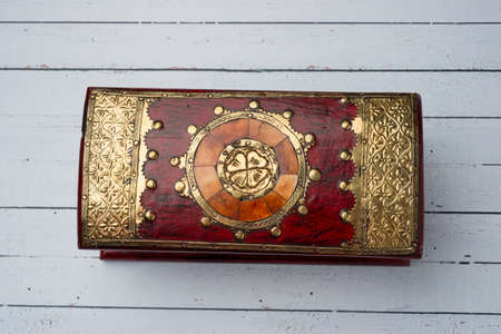 red wood jeweler decorated with gold to store valuable jewelryの写真素材