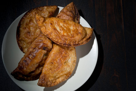 Tuna pie is a traditional tapa in Spain. Each family makes their homemade recipe and the tuna...
