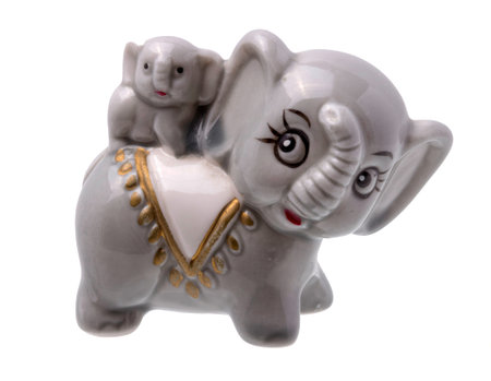Grey Elephant And Elephant Baby Figurine On White Backgroundの写真素材
