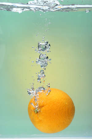 fruit dropped in tankの写真素材