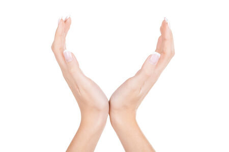 Hands gesturing  Close-up of female hands gesturing while isolated on white backgroundの写真素材