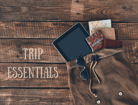 Trip essentials. High angle shot of bag with travel itemsの写真素材