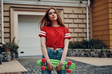 Ready to go wild. Beautiful young woman looking at camera while standing outdoors