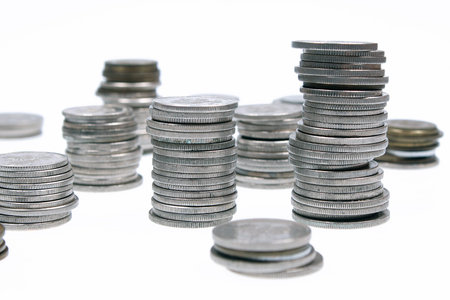 Coin stacks on white background