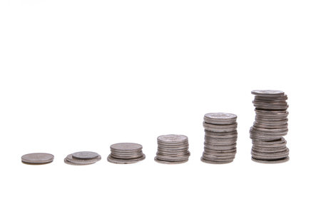 Coin stacks on white background