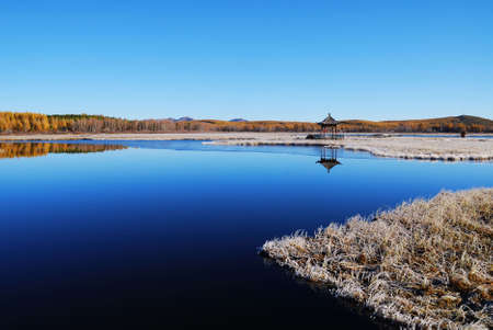 After the winter of Mulan Weichang, very beautiful, especially in the Seven Star Lake in Saihanba above, it is a quiet Shuitianyise the world.の写真素材
