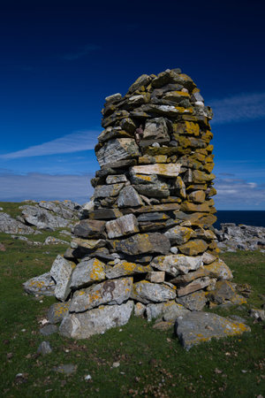 Cairns on the hillside at Port Sgiogarstaigh in the Outer Hebridesの写真素材