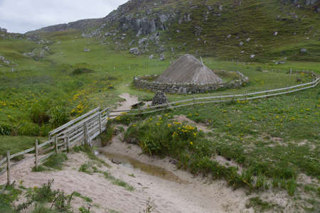 Exterior view of an Iron age Dwelling at Bostadh in the Outer Hebridesの写真素材