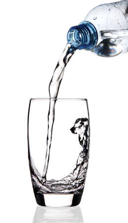 Water being poured into glassの写真素材