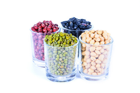 Beans in glass isolate on white background