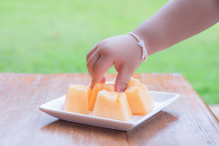 cantaloupe melon slicesの写真素材