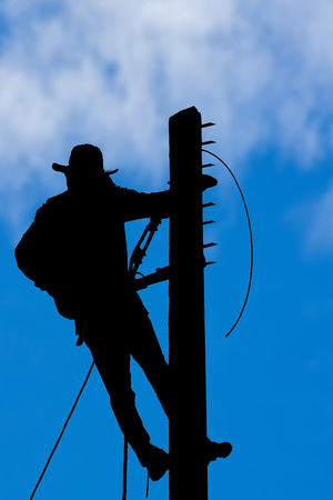 electrician overalls working at height and dangerousの写真素材