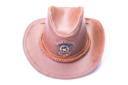 Brown leather hat isolated on white backgroundの写真素材