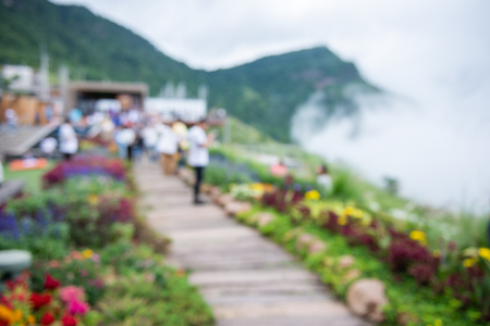 blurred image of people who go on holiday in beautiful natural surroundings and fog.の写真素材