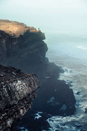 portugal ocean's cliff and rocks at morning sunriseの写真素材