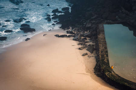 portugal ocean's cliff and rocks at morning sunriseの写真素材