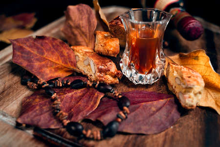 italian cookies and wine, still life photography. autumn colors.の写真素材