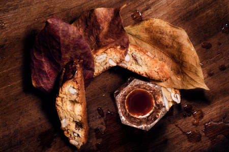 italian cookies and wine, still life photography. autumn colors.の写真素材