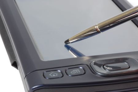 Macro shot of a palm computer and its penの写真素材