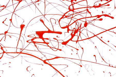 Abstract background of red paint splattered on a white paperの写真素材