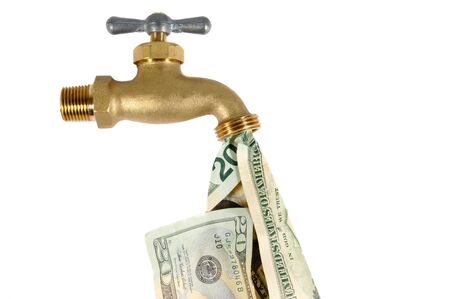 Water tap dripping dollar bills, Water waste conceptの写真素材