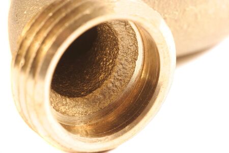 Macro shot of the opening of a water faucetの写真素材