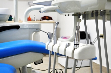 Close up shot inside a dental clinic showing the chair and part of the toolsの写真素材