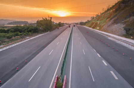 A broad highway under the color cloudの写真素材
