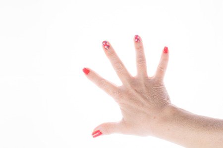 Hand shows a sign on a white backgroundの写真素材