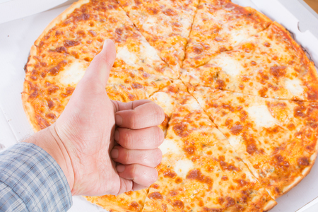 Pizza with four cheeses from close photographedの写真素材