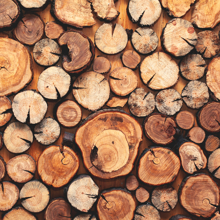 Close up of pile of wooden logs for background or texture, top viewの写真素材