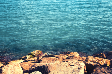 Sea landscape background, water and rock, empty copy spaceの写真素材