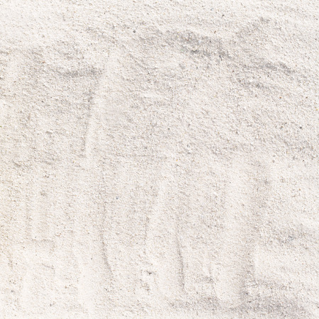 Texture of white sand beach for background の写真素材