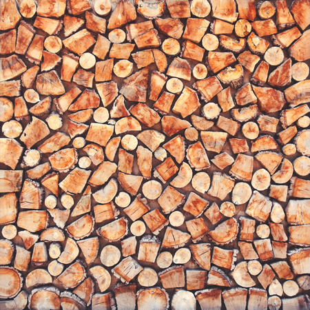 Wooden natural sawn a logs closeup, texture background top viewの写真素材
