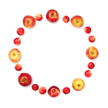 different an apples fruits in the shape of circle isolated on empty white backgroundの写真素材