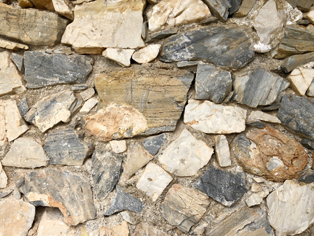 Stone wall for texture or background, close-up detailsの写真素材