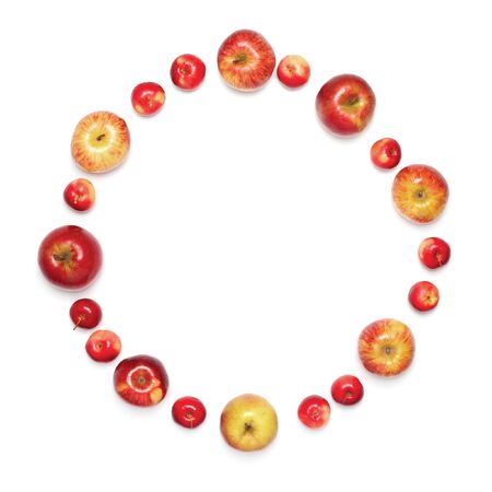 Close-up red apples in the shape of circle isolated on white backgroundの写真素材
