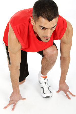 Sport and Fitness - Young athlete preparing to run.の写真素材