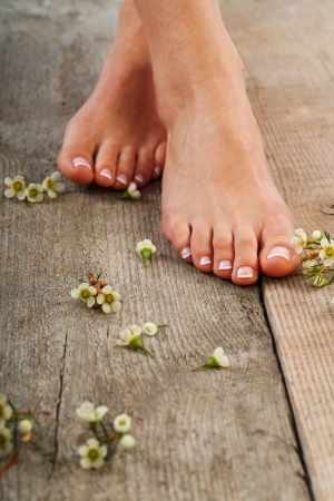 Beauty treatment photo of nice pedicured feetの写真素材